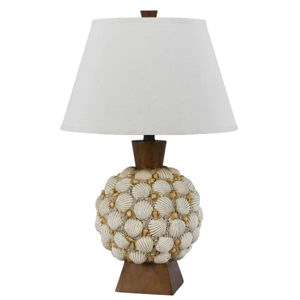 This 25-inch table lamp brings coastal charm with its seashell-inspired resin construction. The durable design includes a coordinating fabric shade and requires minimal assembly, making it an easy decorative addition.
