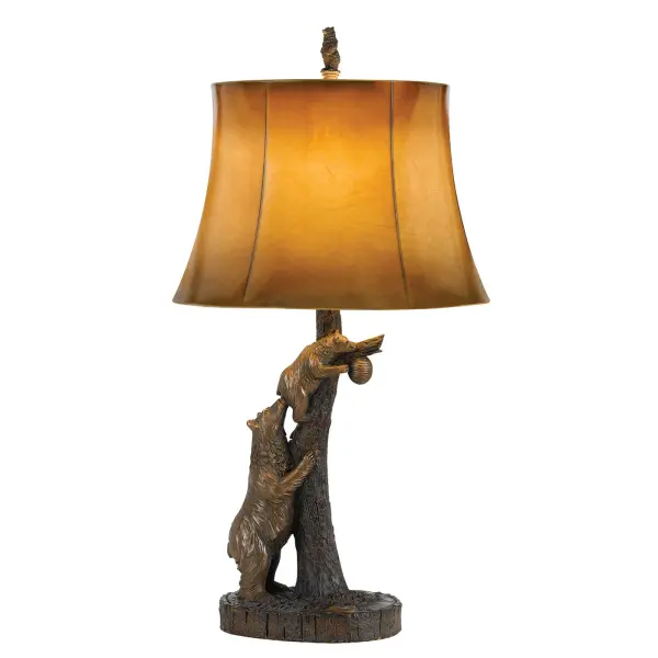 This distinctive table lamp features a hand-crafted resin bear and cub design that brings woodland charm to any space. The warm-toned leatherette shade complements the nature-inspired base, while 3-way lighting provides versatile illumination up to 150W.