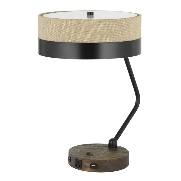 The Parson desk lamp combines practical task lighting with modern charging convenience. Featuring dual USB ports and an electrical outlet, this metal and wood lamp offers both style and functionality for contemporary workspaces.