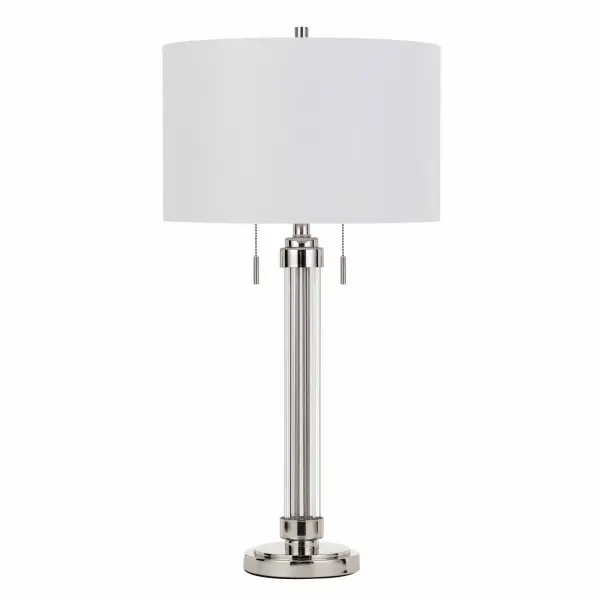 The Montilla combines durable metal construction with an acrylic outer shell and fabric drum shade for a sophisticated contemporary look. At 31" tall with dual 60W bulbs, it provides ample illumination for living spaces.