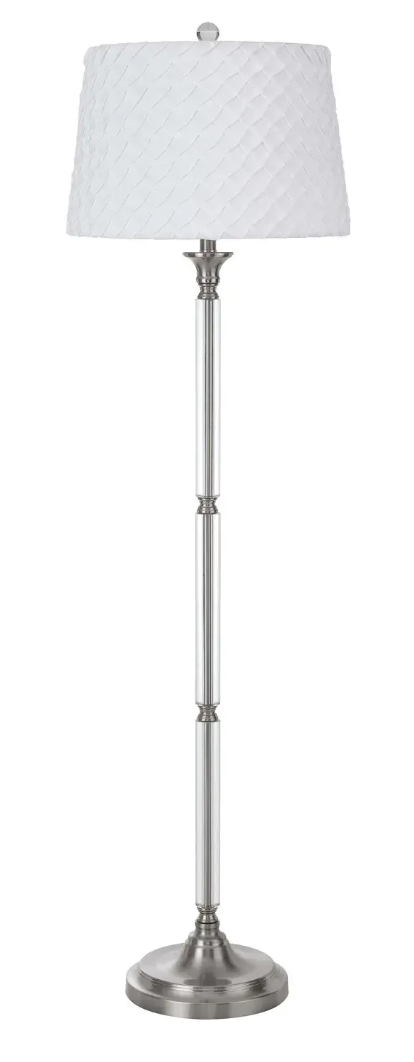 The Ruston floor lamp combines modern aesthetics with functional lighting. Its brushed steel finish offers a sophisticated neutral tone that complements various interior styles, making it ideal for living spaces and offices.