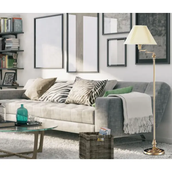 This traditional-style floor lamp combines timeless antique brass finish with practical swing arm functionality. Perfect for reading nooks or beside seating, it offers 3-way lighting control and includes a matching fabric shade. - alternate view