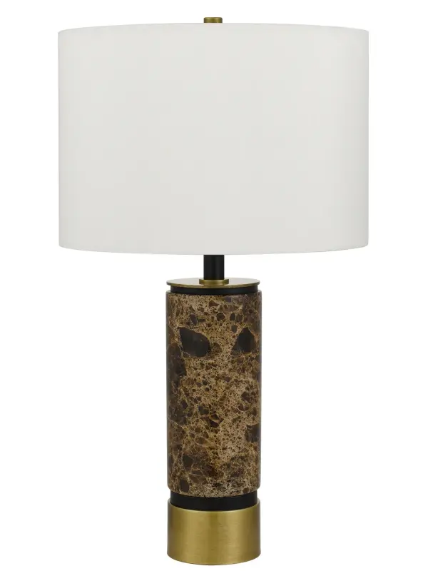 The Salford table lamp combines warm antique brass with luxurious black marble for a refined look that bridges traditional and contemporary styles. At 22.25" tall, it provides substantial presence without overwhelming.