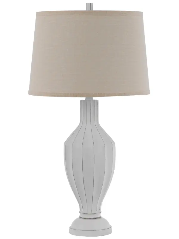 The Hoover table lamp brings casual coastal charm with its white washed finish and substantial 31-inch height. Perfect for creating a relaxed, beachy atmosphere in bedrooms and living spaces.