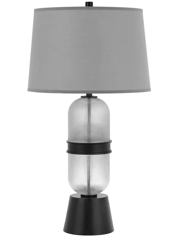 The Sesto table lamp combines contemporary style with practical dual-light functionality. Its frosted glass shade paired with black accents creates a sophisticated look that works in both residential and commercial settings.