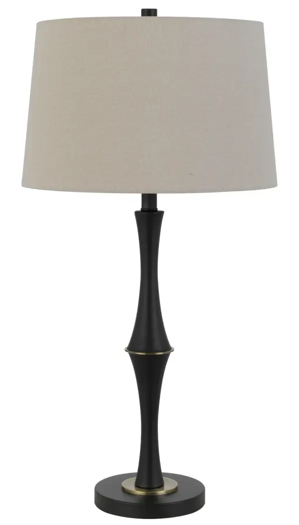 The Salter floor lamp combines matte black and antique brass finishes for a sophisticated two-tone look. At 31 inches tall with a 16-inch footprint, it's perfectly sized for reading nooks, beside chairs, or accent lighting.