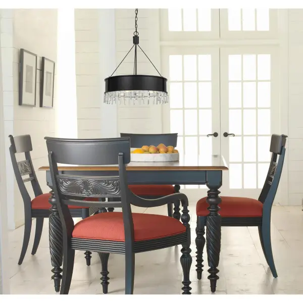 The Roby chandelier combines durable metal construction with an industrial aesthetic, featuring four lights and an iron finish. Its 24.5-inch width makes it suitable for medium-sized spaces, while the 6-foot chain allows flexible installation height. - alternate view