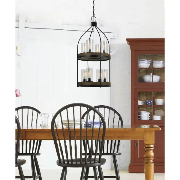 The Chardon chandelier combines durable metal framework with warm wood accents in an Iron Wood finish. This 8-light fixture spans 20 inches square and features an open industrial design perfect for modern farmhouse or rustic interiors. - alternate view