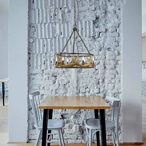 This 6-light antler chandelier combines rustic appeal with durable steel and resin construction. The 26-inch diameter and rust finish create an authentic lodge aesthetic perfect for casual dining and living spaces. - alternate view