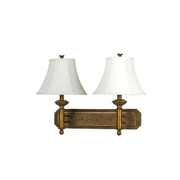 This traditional wall lamp features a distinctive pineapple motif in warm antique gold finish. Built with durable metal construction and convenient push-button access, it's designed for both residential and hospitality applications.