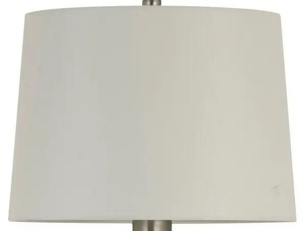 A classic 17-inch drum shade offering an easy way to refresh existing fixtures. The neutral fabric design works across multiple room types and décor styles, making it a practical choice for homeowners and designers.