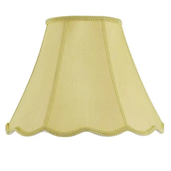 This 14-inch champagne fabric shade features classic scalloped edges with decorative piping, bringing traditional elegance to any fixture. The warm champagne tone diffuses light beautifully while adding sophisticated style.