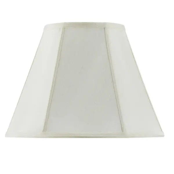 This 14-inch empire shade in soft eggshell fabric features refined piped trim detailing. The timeless silhouette and neutral tone make it a versatile choice for updating table and floor lamps in traditional to transitional interiors.
