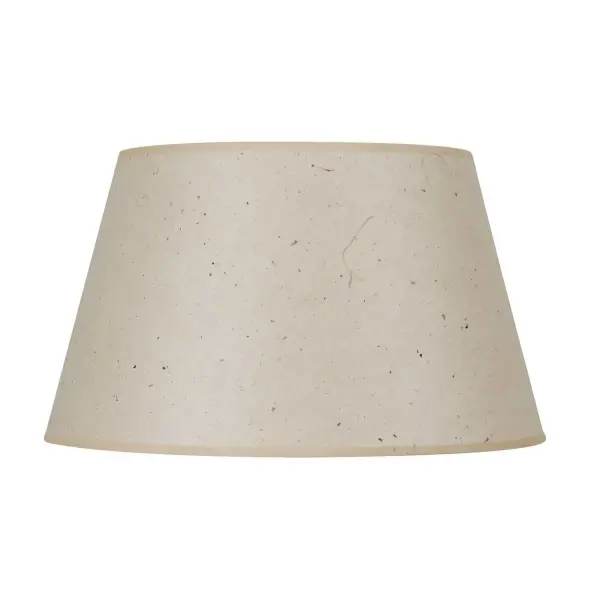 This 16-inch drum shade in natural kraft paper offers a versatile, eco-conscious design element that softens light beautifully. The neutral tone complements multiple styles while adding organic warmth and texture.
