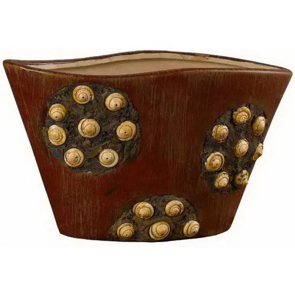 The Roseville Ceramix Vase combines durable ceramic construction with timeless design. At 5.5 inches tall, it's perfect for small floral arrangements or as a standalone decorative accent in any room.