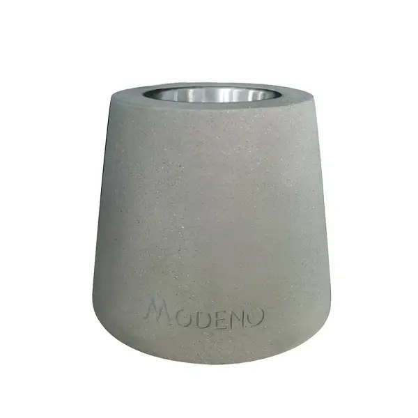 The MODENO ENTTA brings real flame ambiance to any tabletop with its cast concrete construction and clean-burning ethanol fuel. Compact 6.3" footprint fits coffee tables, dining surfaces, or outdoor spaces.