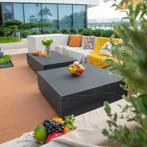 The Colorado Large Coffee Table combines modern design with durable GFRC construction. At 40" square, this substantial piece anchors living spaces with its clean lines and sandstone finish, suitable for both indoor and outdoor use. - alternate view