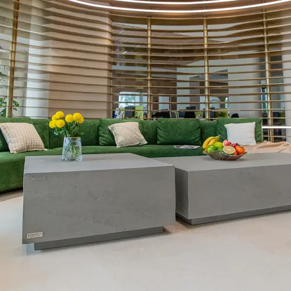 The Colorado Medium Coffee Table combines modern design with durable GFRC construction in a sandstone finish. Its 33.9-inch square top and 132-pound weight provide stability and presence for indoor or outdoor living spaces. - alternate view