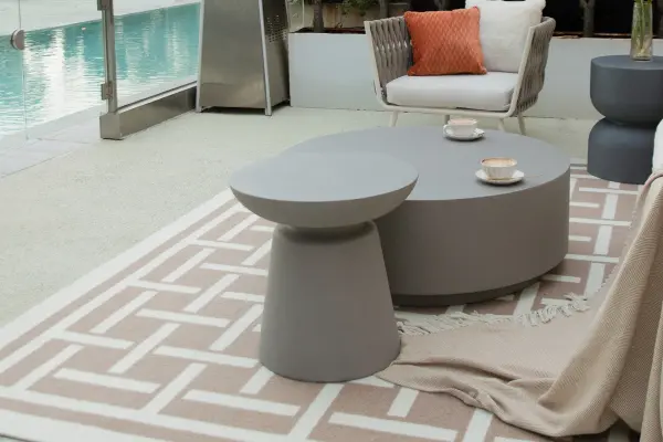 The KYLIX side table combines contemporary design with durable GFRC construction. Its 20-inch cube form offers a bold architectural presence while remaining functional as an accent table for indoor or outdoor spaces. - alternate view