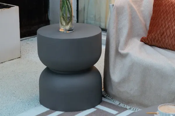 The CHRONOS side table features durable GFRC construction in a compact 17.7" square design. Its contemporary aesthetic and weather-resistant material make it suitable for both indoor and outdoor settings. - alternate view