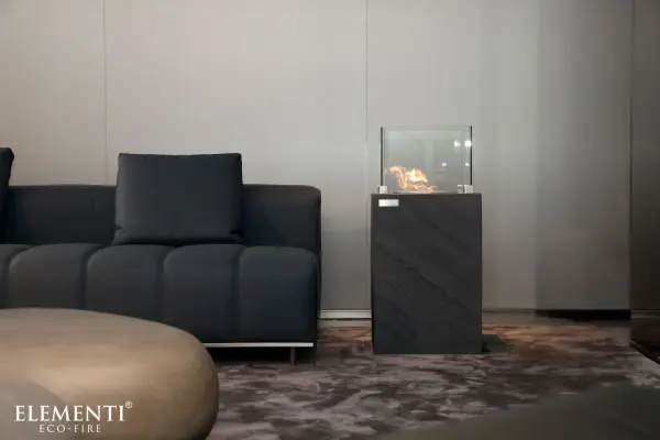 The Zermatt combines artisanal concrete craftsmanship with modern ethanol fire technology. Its compact 15.7" square footprint and adjustable 18,000 BTU burner make it perfect for intimate indoor or outdoor spaces. - alternate view