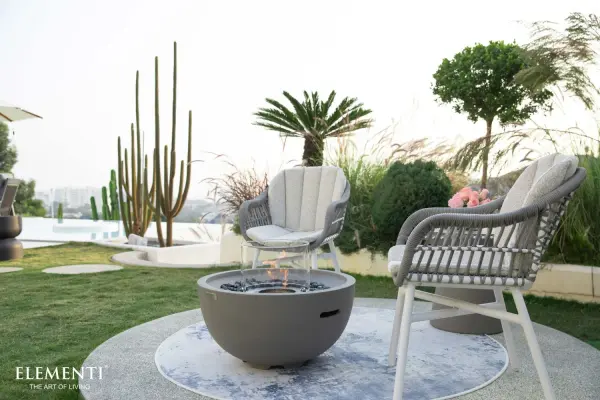The Nantucket combines artisanal concrete craftsmanship with modern ethanol technology. Its 18,000 BTU adjustable burner provides ambiance and warmth both indoors and outdoors, while the handcrafted GFRC construction ensures durability. - alternate view