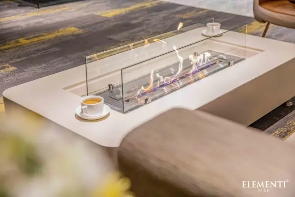 The Sydney Ethanol Fire Table combines contemporary design with functional warmth. Handcrafted from glass-fiber reinforced concrete with a 304 stainless steel burner, it delivers 23,000 BTUs of adjustable heat for up to 9 hours. - alternate view