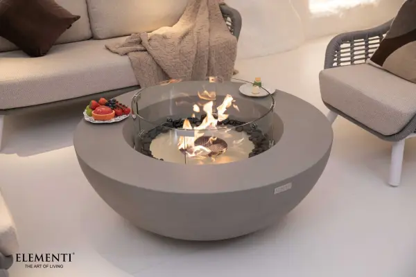 The Lunar Bowl combines handcrafted concrete artistry with powerful ethanol heating technology. This 42-inch round fire table delivers up to 43,000 BTUs with adjustable flame control, creating ambiance for 3.5-13 hours per fill. - alternate view