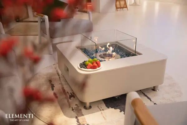 The Aegean combines artisanal concrete craftsmanship with marble porcelain elegance, featuring a 28,000 BTU adjustable ethanol burner. Perfect for creating ambiance both indoors and outdoors with 2-5.5 hour burn time. - alternate view