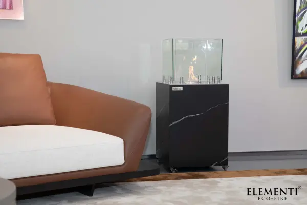 The Quebec combines sophisticated marble porcelain construction with intelligent one-touch fuel refilling and electronic ignition. Delivers 27,000 BTUs of adjustable heat with 5.5-hour burn time, perfect for both indoor and outdoor entertaining. - alternate view