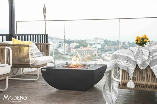 The Modeno Aurora Fire Table combines contemporary design with powerful heating capability. Constructed from glass-fiber reinforced concrete with a stainless steel burner system, it delivers 50,000 BTUs of warmth. - alternate view