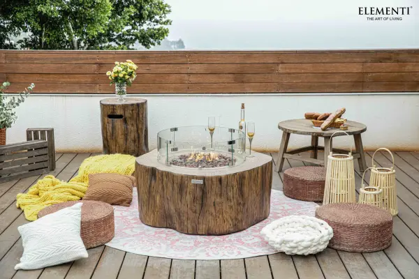 The Manchester Fire Table combines artisanal glass-fiber reinforced concrete construction with powerful heating capability. Features stainless steel burner system, push-button ignition, and includes lava rock media and canvas cover. - alternate view