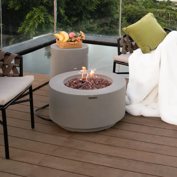 The Modeno Waterford Fire Table combines modern concrete construction with powerful 40,000 BTU heating. Features stainless steel burner system, push-button ignition, and includes lava rock media and protective cover. - alternate view