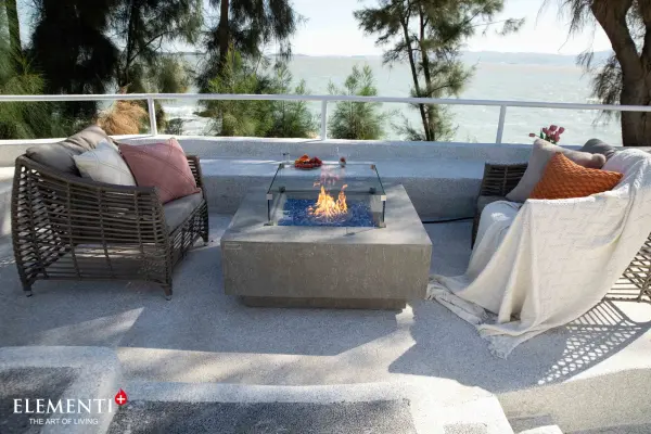 The Victoria Fire Table combines contemporary design with powerful heating capability. Handcrafted from glass-fiber reinforced concrete with a 12-inch stainless steel burner, it delivers 60,000 BTUs of warmth. - alternate view