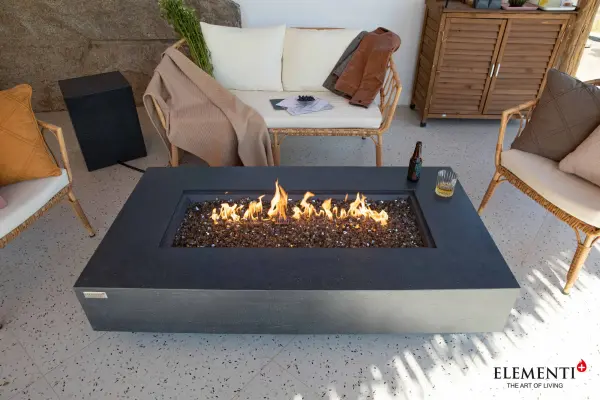 The Positano Fire Table combines contemporary design with robust functionality, featuring handcrafted glass-fiber reinforced concrete and a powerful 60,000 BTU stainless steel burner for exceptional outdoor ambiance. - alternate view