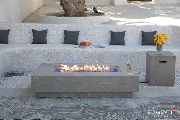 The Riviera Fire Table combines handcrafted glass-fiber reinforced concrete construction with a powerful 60,000 BTU stainless steel burner. At 60 inches long, it creates a stunning focal point for outdoor entertaining. - alternate view