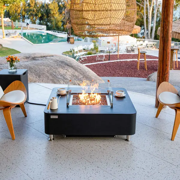 The Annecy combines sophisticated marble porcelain construction with powerful 60,000 BTU heating. Features premium stainless steel burner, push-button ignition, and includes Caribbean blue fire glass for stunning visual appeal. - alternate view