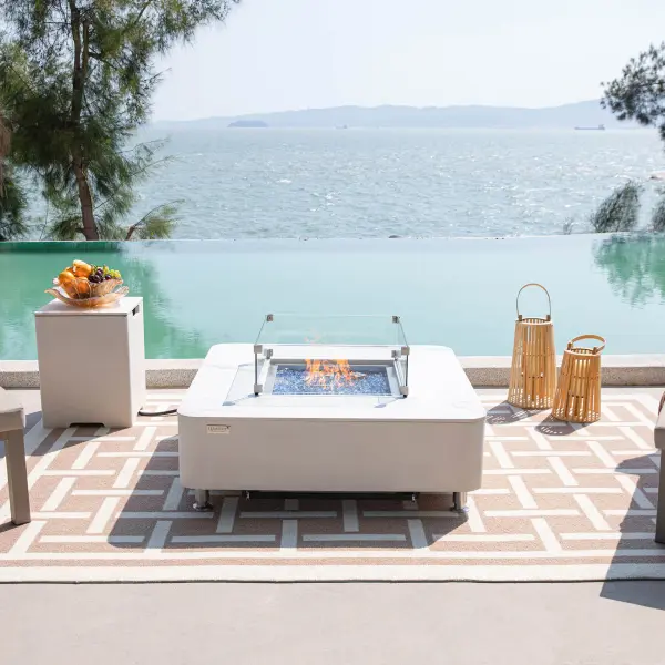 The Annecy combines sophisticated marble porcelain construction with powerful 60,000 BTU heating. Features premium stainless steel burner, push-button ignition, and includes fire glass, cover, and accessories. - alternate view