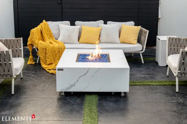 The Elementi Plus Bianco combines sophisticated marble porcelain construction with powerful 60,000 BTU heating. Features premium stainless steel burner, push-button ignition, and includes fire glass, cover, and accessories. - alternate view