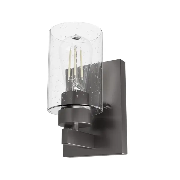 Let the Harland sconce be the guiding light leading your guests to the areas you want to highlight. This light is a mixture of metal and wood-inspired detailing featuring a beautiful, seeded glass shade. Place two or three down a long hallway or place two on either side of a work of art or mirror to give light to your fantastic style. Add other lights from the Hartland collection to create a warm, inviting space. Rated for indoor spaces exposed to humidity Requires 1 E26 bulbs. Bulbs not included. Mounts Up or Down INDOOR-DAMP RATED: For use in indoor spaces exposed to humidity like bathrooms and laundry rooms. BULB RECOMMENDATION: Maximum W per light bulb or equivalent LED bulb. Bulbs not included. PICTURED HERE: Match our image using ST64 Edison light bulbs. WARRANTY: One-year limited warranty backed by the trusted experts at Hunter.