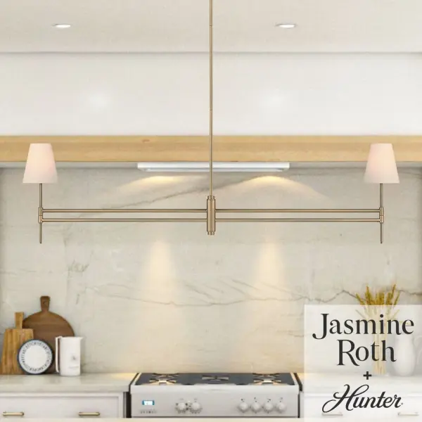 The Camelia Stem chandelier brings refined sophistication to modern interiors with its clean lines and organic silhouette. The luxe gold finish adds warmth while maintaining a minimalist aesthetic, making it versatile across various design schemes. - alternate view
