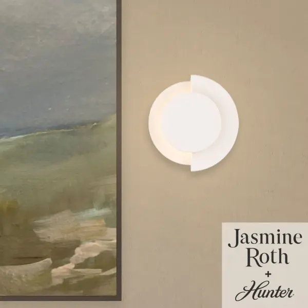 Refresh your space with the Opaline Crest Jasmine Roth LED 8 Inch Sconce, a modern fixture defined by clean lines and a naturally inspired aesthetic. Indoor-damp rated, it is ideal for bathrooms, laundry rooms, and other humidity-prone spaces. This light can be mounted up or down for versatile styling. Designed to coordinate with the Jasmine Roth lighting collection, this sconce is backed by Hunter's trusted one-year limited warranty. Rated for indoor spaces exposed to humidity. Integrated LED light included. Mounts Up or Down Clean lines, minimal, natural. INDOOR-DAMP RATED: For use in indoor spaces exposed to humidity like bathrooms and laundry rooms. MODERN: The clean lines of the modern style uses a monochromatic color palette the inspires with clean lines, minimalism, natural materials, and natural light. COORDINATING COLLECTION: Works with Jasmine Roth Lighting collection. WARRANTY: One-year limited warranty backed by the trusted experts at Hunter.