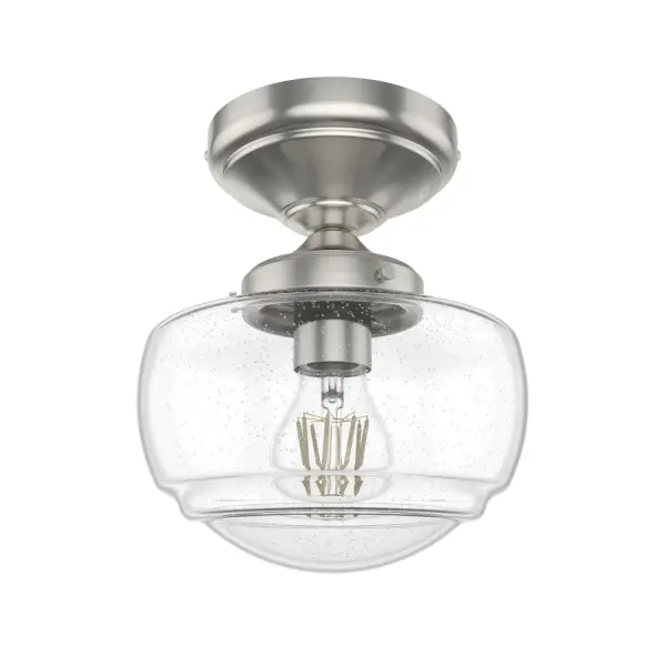 The Saddle Creek brings timeless American schoolhouse charm to low-ceiling spaces. Its compact 7.5-inch profile and seeded glass shade deliver character without overwhelming smaller rooms, making it perfect for hallways and bathrooms.