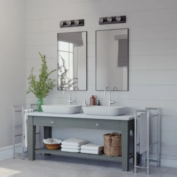 The Donelson 3-light vanity combines rustic farmhouse charm with industrial styling through its natural black iron finish and wood-inspired design. Perfect for bathrooms seeking a clean, uncluttered aesthetic with functional lighting. - alternate view