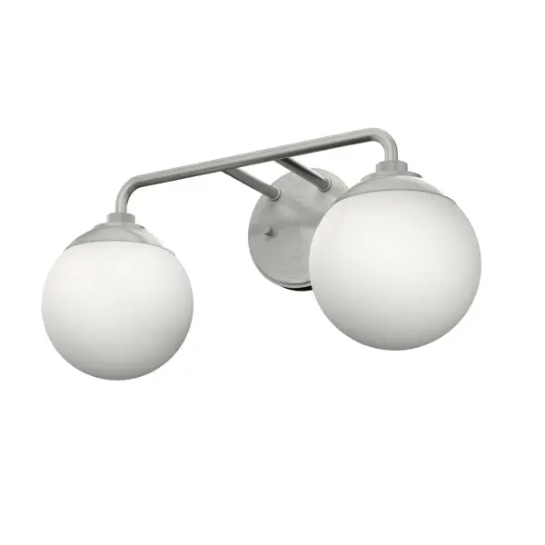 The Hepburn vanity light brings 1920s theater glamour and mid-century geometry to modern bathrooms. Its brushed nickel finish and cased white glass create a sophisticated look perfect for smaller spaces without sacrificing style.