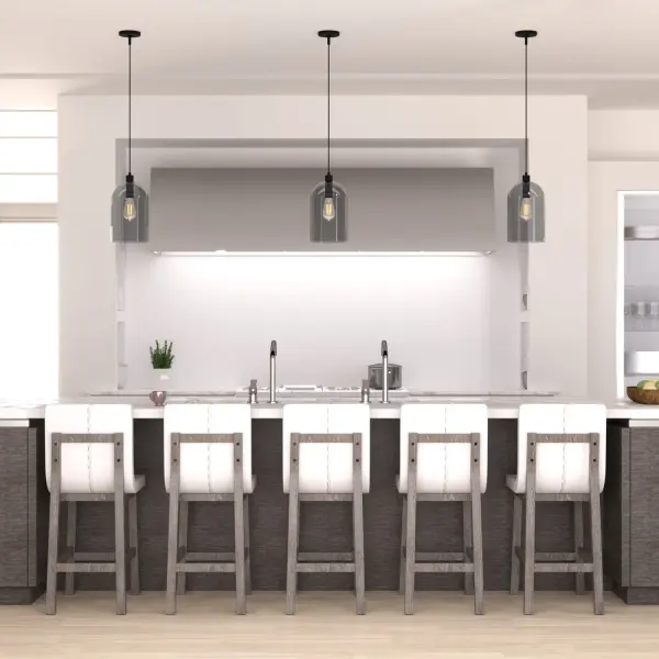The Lochemeade pendant delivers clean, modern style with its smoked glass dome and black iron finish. Compact at 9 inches wide, it's ideal for kitchen islands, dining nooks, or clustered installations. The simple silhouette works across modern, industrial, and minimalist interiors. - alternate view