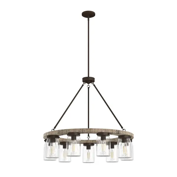 The Devon Park chandelier delivers authentic farmhouse character with its wagon wheel-inspired design, distressed Onyx Bengal finish, and clean ironwork. Nine Edison bulbs create warm ambient lighting perfect for gathering spaces.