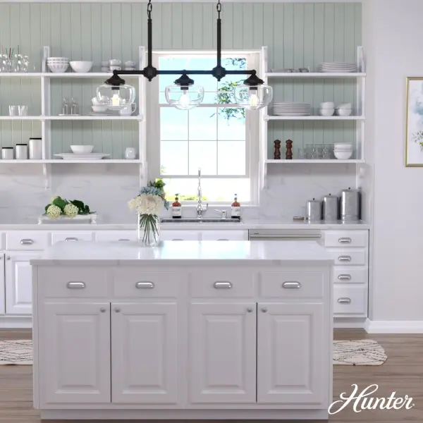 A modern spin on schoolhouse style, the Saddle Creek linear chandelier could perfectly complement your kitchen, dining room, or home office. Brighten up your breakfast nook or keep dinner conversations lit with this contemporary take on a classic design. The choice of metal finish offsets the fixture's trio of globes, available in cased white or clear seeded glass. Mix and match with other fixtures from this collection or from our ceiling fan designs. Rated for indoor use only Requires 3 E26 bulbs. Bulbs not included. MADE FOR INDOORS: For use in indoor spaces like kitchens, bedrooms, living rooms, dining rooms, and entryways. BULB RECOMMENDATION: Maximum 60 W per light bulb or equivalent LED bulb. Bulbs not included. PICTURED HERE: Match our image using ST64 Edison light bulbs. CUSTOMIZABLE HANGING OPTIONS: With the minimum required chain, the hanging length is 25.5 inches. When using all of the included chain, the maximum hanging length is 98.75 inches. WARRANTY: One-year limited warranty backed by the trusted experts at Hunter. - alternate view