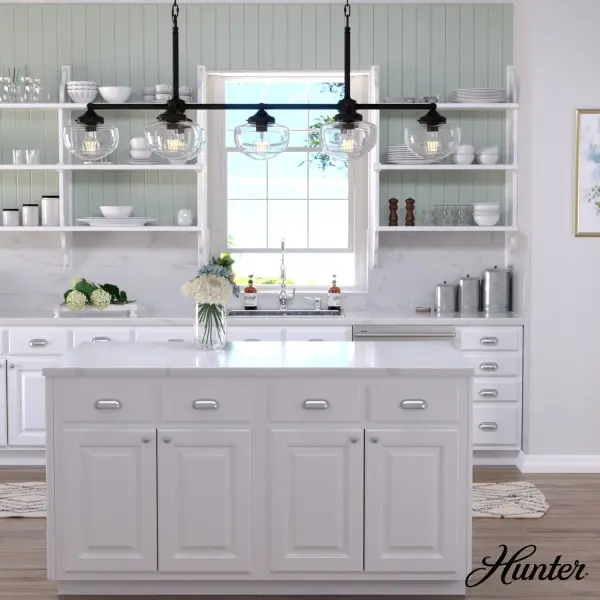 With its modern take on schoolhouse style, the Saddle Creek linear chandelier might be the perfect fixture for your home's dining room or kitchen. Artfully arranged glass globes offset the chandelier's simple metal finish, creating a piece elegant enough to accent a formal dining room yet casual enough for a kitchen island. The Saddle Creek offers a fresh look at a classic design. Rated for indoor use only Requires 7 E26 bulbs. Bulbs not included. MADE FOR INDOORS: For use in indoor spaces like kitchens, bedrooms, living rooms, dining rooms, and entryways. BULB RECOMMENDATION: Maximum 60 W per light bulb or equivalent LED bulb. Bulbs not included. PICTURED HERE: Match our image using ST64 Edison light bulbs. CUSTOMIZABLE HANGING OPTIONS: With the minimum required chain, the hanging length is 23.5 inches. When using all of the included chain, the maximum hanging length is 96.75 inches. WARRANTY: One-year limited warranty backed by the trusted experts at Hunter. - alternate view