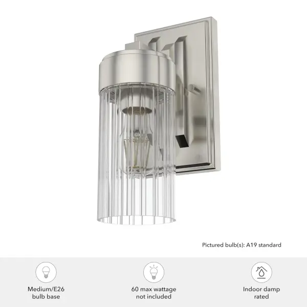 Want to add a sprinkle of glam to your space? The Gatz wall sconce is the perfect way to add a touch of sparkle and draw the eye to areas you want to highlight. In your entryway, your kitchen, or your living room, this fluted glass and metal design lights your space in style. But you don't have to stop with the sconces. Add more lights from the collection to spread glamour throughout your home. Rated for indoor spaces exposed to humidity Requires 1 E26 bulbs. Bulbs not included. Mounts Up or Down INDOOR-DAMP RATED: For use in indoor spaces exposed to humidity like bathrooms and laundry rooms. BULB RECOMMENDATION: Maximum 60 W per light bulb or equivalent LED bulb. Bulbs not included. PICTURED HERE: Match our image using A19 Standard light bulbs. WARRANTY: One-year limited warranty backed by the trusted experts at Hunter. - alternate view